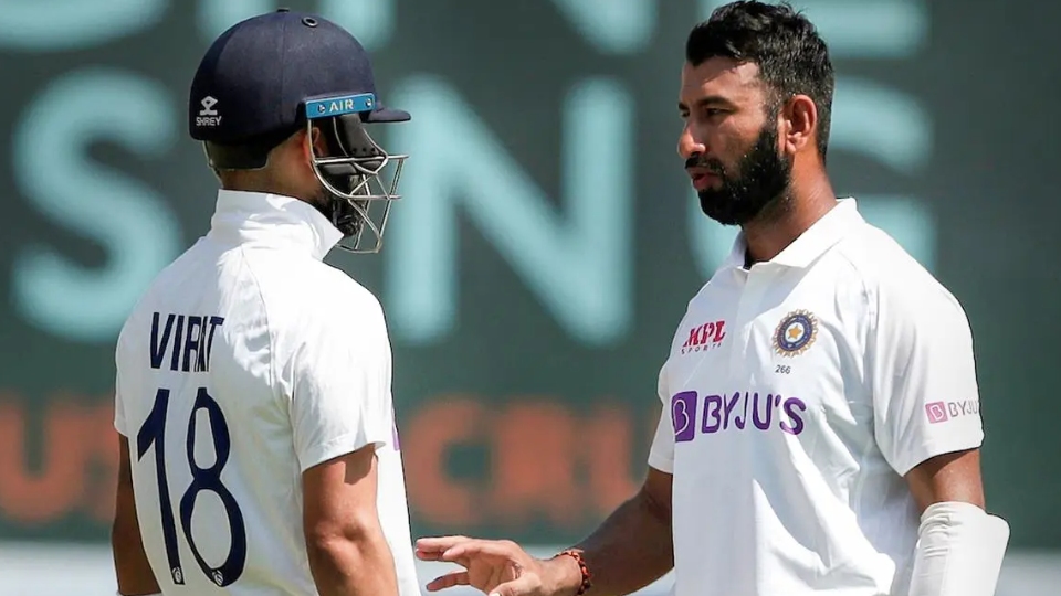 pujara with virat kohli